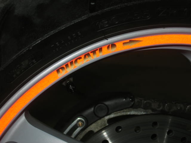 Tapeworks reflective red stripe w. gold ducati emblem