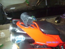 perfict size,hides gps,tank bag,even helment on seat,dry too