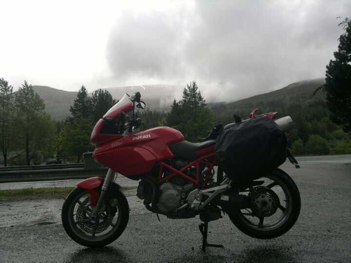 through the clouds is the tallest mountain in Scotland Ben Nevis