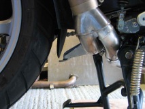 Cat by-pass pipe - centre stand stop